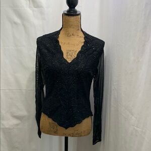 Elegant, upscale and gorgeous beaded top.